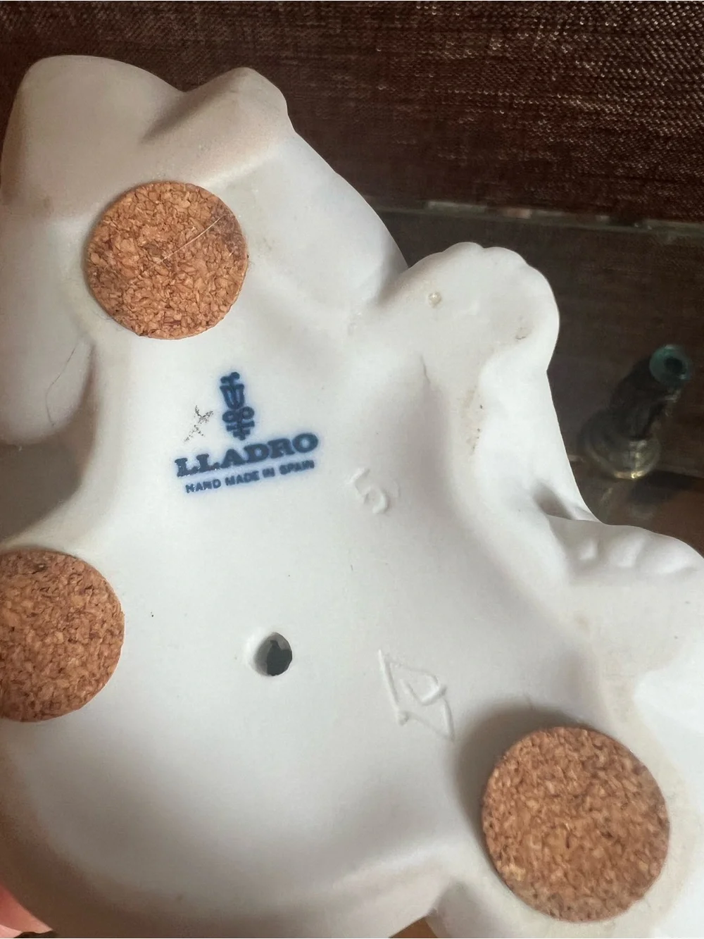 Retired Lladro “Eskimo Playing” matte bisque figurine